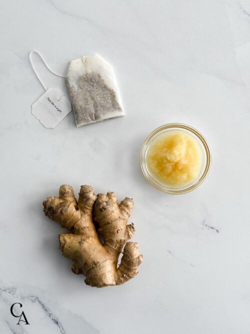 Varieties of ginger on a white surface.