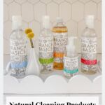 Bottles of cleaners in a white tray on a counter.