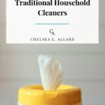 A container of cleaning wipes with text.