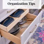 Kitchen drawers with pots and pans.