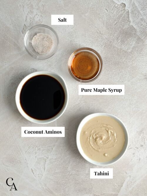 Bowls of ingredients to make tahini sauce with maple syrup.