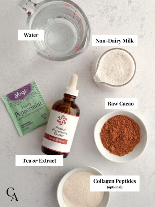 Flat lay of ingredients, including water, non-dairy milk, raw cacao powder, collagen peptides, peppermint tea, and extract.